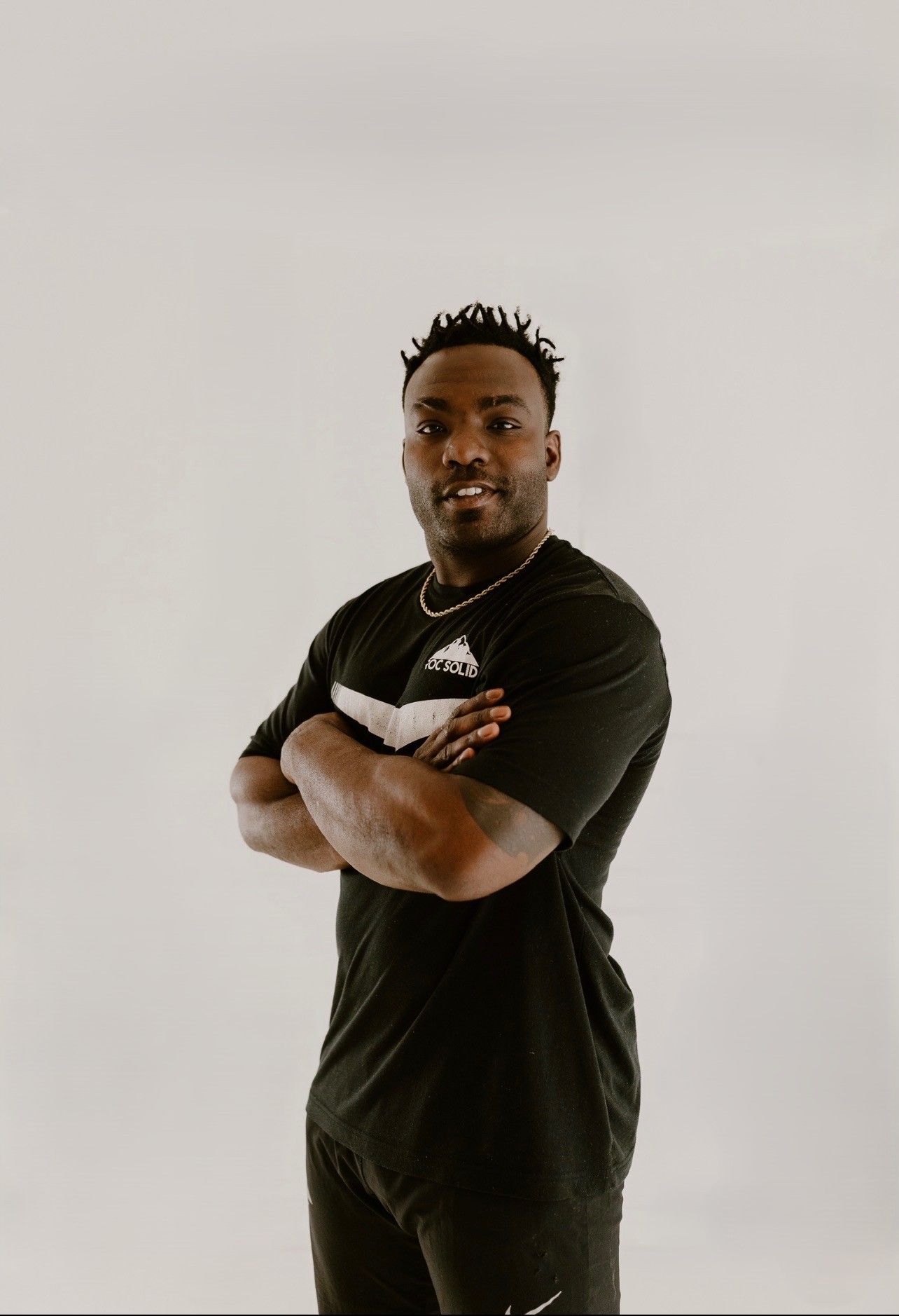 Coach Ben Birmingham posing at Roc Solid Training facility in Edmond, Oklahoma